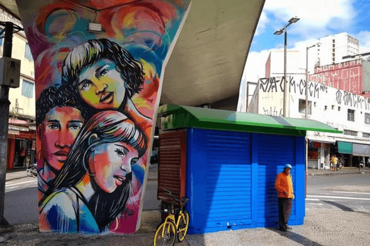 Graffiti by Italian artist Alice Pasquini colors a runway column in the Lagoinha neighborhood